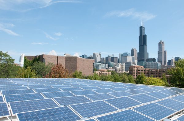 Chicago skyline with solar panels in foreground.